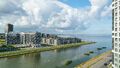 Из окон большинства квартир открывается вид на воду залива и каналов, на Южно-Приморский парк, мосты и нарядные современные кварталы.